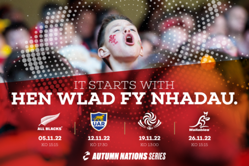 A poster reading "it starts with Hen Wlad Fy Nhadau" and a young boy in red, singing