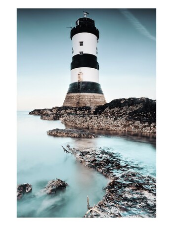 The lighthouse at Penmon, Anglesey. 

A long exposure calms down the waves.