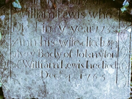 Flat memorial stone for William Lewis died 1733 and his wife Ann died 1765