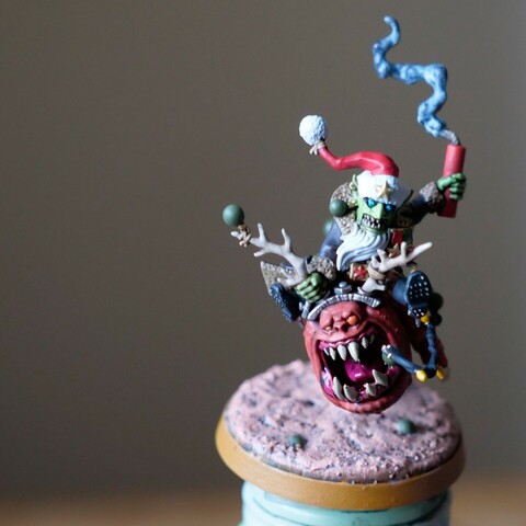 A Warhammer 40,000 miniature (the Red Gobbo on Bounca). The other photos are the same miniature from different angles.