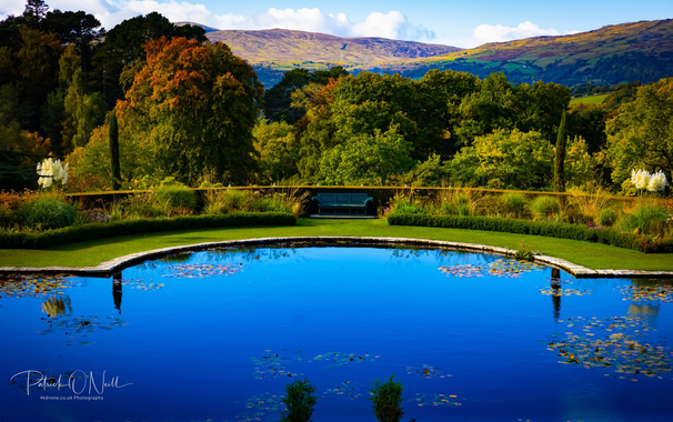 Bodnant garden pond view to Snowdonia, Wales UK