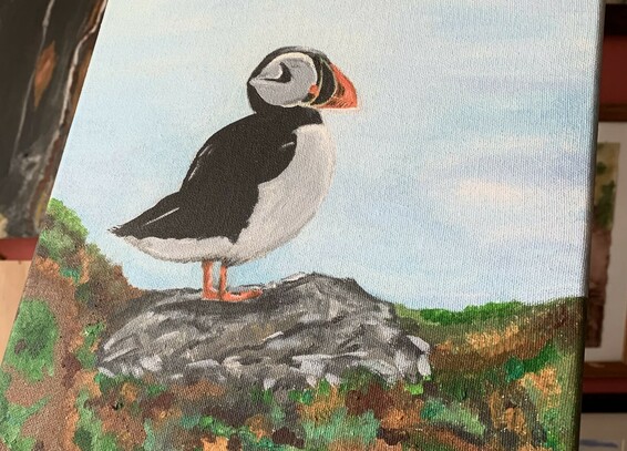 A painting of a puffin