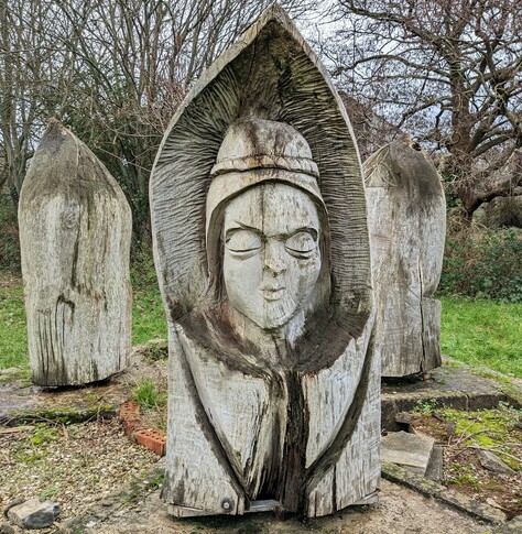 One of wooden sculpture of Arthur, Guinevere and Lancelot 