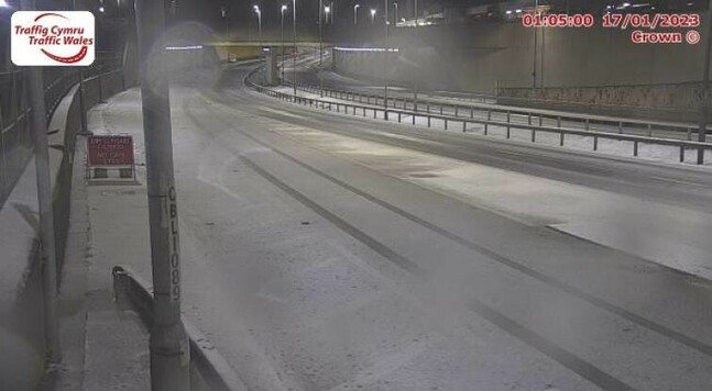 Webcam showing snow on J21 sliproad on A55.