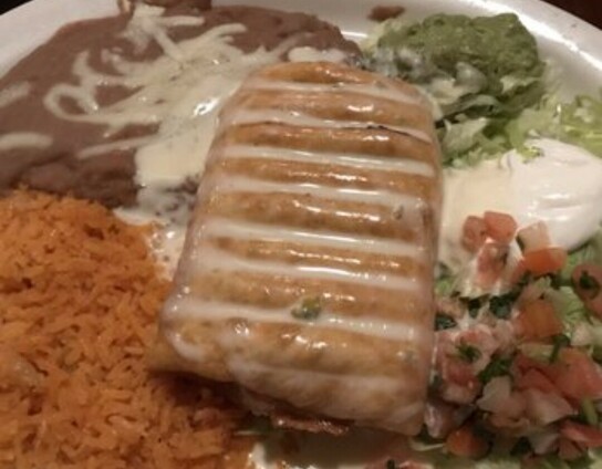 A cheap chimichanga with sketchy quack and watery refried beans - a previous picture from one of my local Mexican Restaurants!