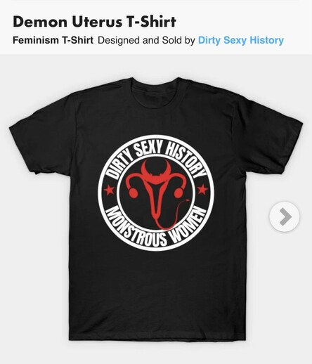 A black t-shirt with a logo that looks like a hardcore band. It’s a red uterus with horns and a devil tail. In a circle around it, it says “Dirty Sexy History” (the name of the podcast) and “Monstrous Women” (the title of the episode and Dr Dittmer’s new book)