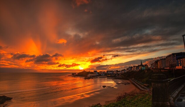 A beautiful red and orange Sunrise over Tenby Harbour, West Wales