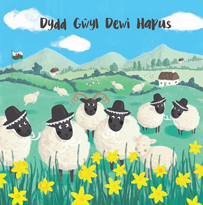 cartoon sheep in a hilly field wearing traditional Welsh hats. The text reads "Dydd Gwyl Dewi Hapus"