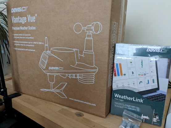 A picture of the box that the Davis Vantage Vue weather station comes in, and next to it, a smaller box for the Davis WeatherLink USB data logger