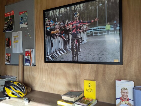 Inside our clubhouse, with a picture of Tom Pidcock on the wall