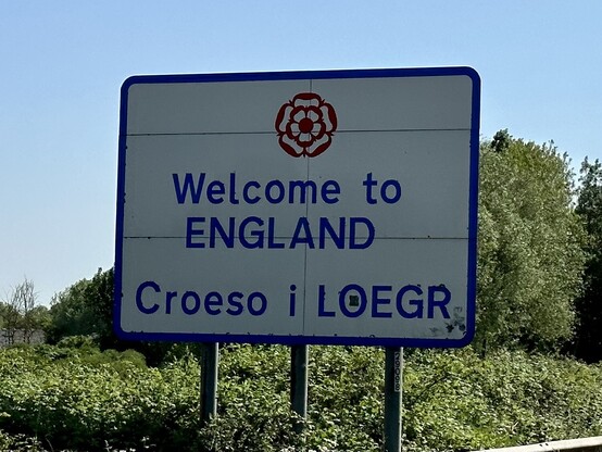The sign welcoming us back to England from Wales. The Welsh version of the message is at the bottom of the sign. 