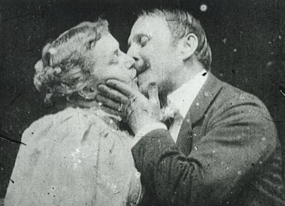 Woman and man kissing 
