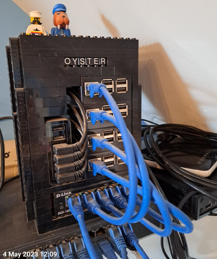 A cluster of four Raspberry Pi computers, in Lego compatible cases.