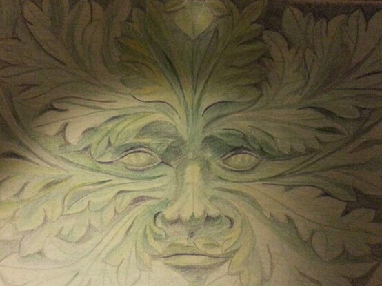 Sketch of a green man using coloured pencils.