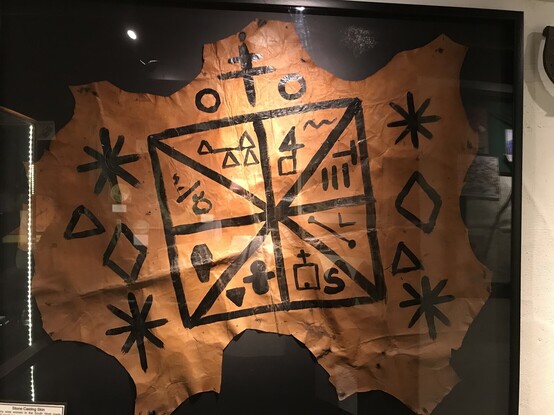 Dried skin with symbols drawn on to divine the future.