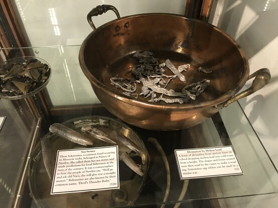 Bowls with pieces of dried lead in them.