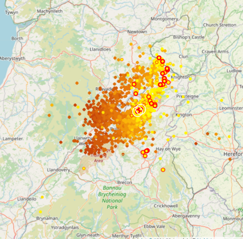 A screenshot of part of a live lightning map, showing a large area of lightning over part of Wales. 