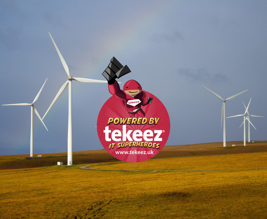 A field with several wind turbines in, in the middle is a red circular Tekeez logo with a flying Super Tim in the middle.