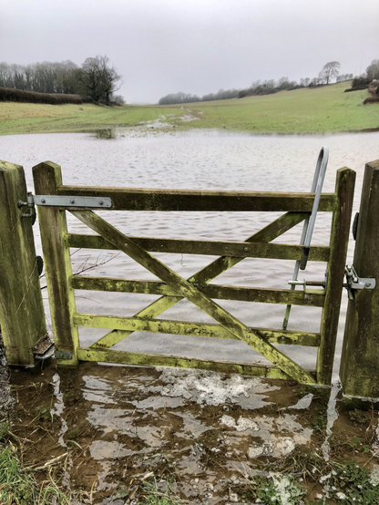 Flooded path and field surrounding the gate and right of way a few miles west of Cowbridge close to the A48