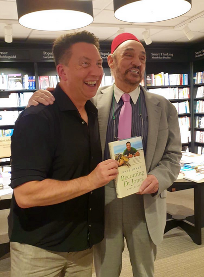 Dr Rhys Jones sharing his autobiography’Becoming Dr Jones’ with actor John Rhys Davies.