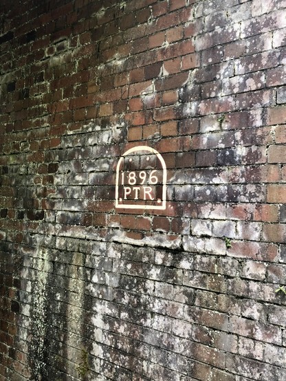 Located under a bridge a painted date of 1896 with PTR underneath. 
