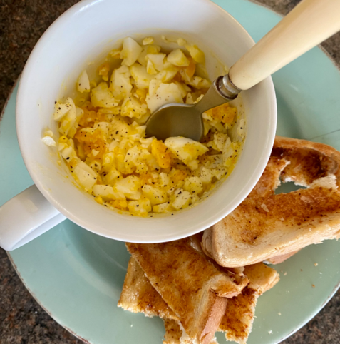 Chuckie Egg the egg consumption mode! Smashed up egg in a cup with lashings of butter, salt and pepper, and toast. Mmm eggy goodness!