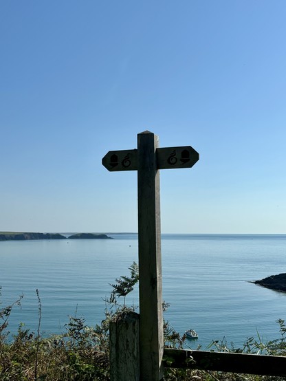   Views over Milford Haven docks  with blue sky and calm sea 