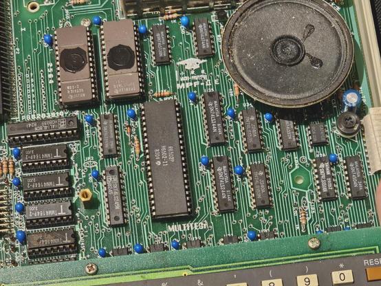 A partial image of a Multitech Micro-Professor II (MPF-II) mainboard. Near the centre of the image is the MOS Technology 6502 CPU - dated 1983.