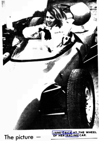 Young woman in a racing car 