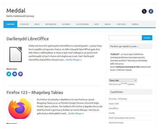 Llun o dudalen flaen gwefan Meddal sy'n dangos manylion y rhaglenni diweddaraf yn Gymraeg. Mae dewis helaeth o raglenni i'w cael yn Gymraeg, Firefox, Thunderbird, LibreOffice, WordPress ac yn y blaen :-)