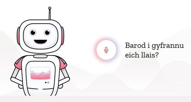 Llun o robot bach pinc Common Voice a'r anogaeth "Barod i gyfrannu eich llais?"